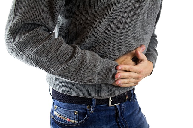 Can low back pain cause abdominal pain?